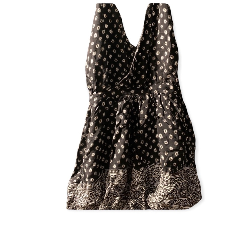 Olivaceous Black and White Halter Floral Patterned Romper - Picture 1 of 9
